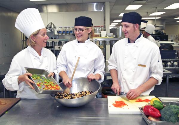 Three students of the Culinary Arts program at VIU’s Culinary School